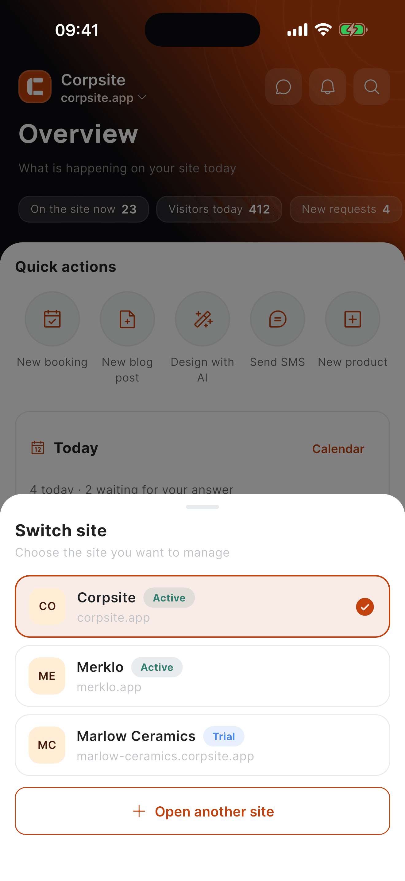 The Corpsite app site switcher listing corpsite.app and merklo.app
